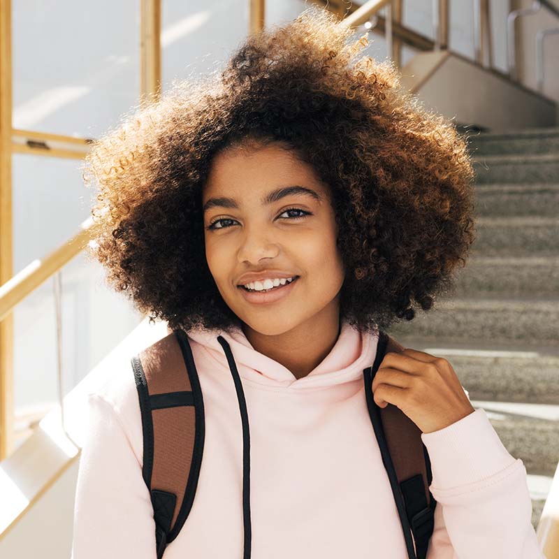 portrait of a beautiful girl standing in high scho 5fklr6m.jpg