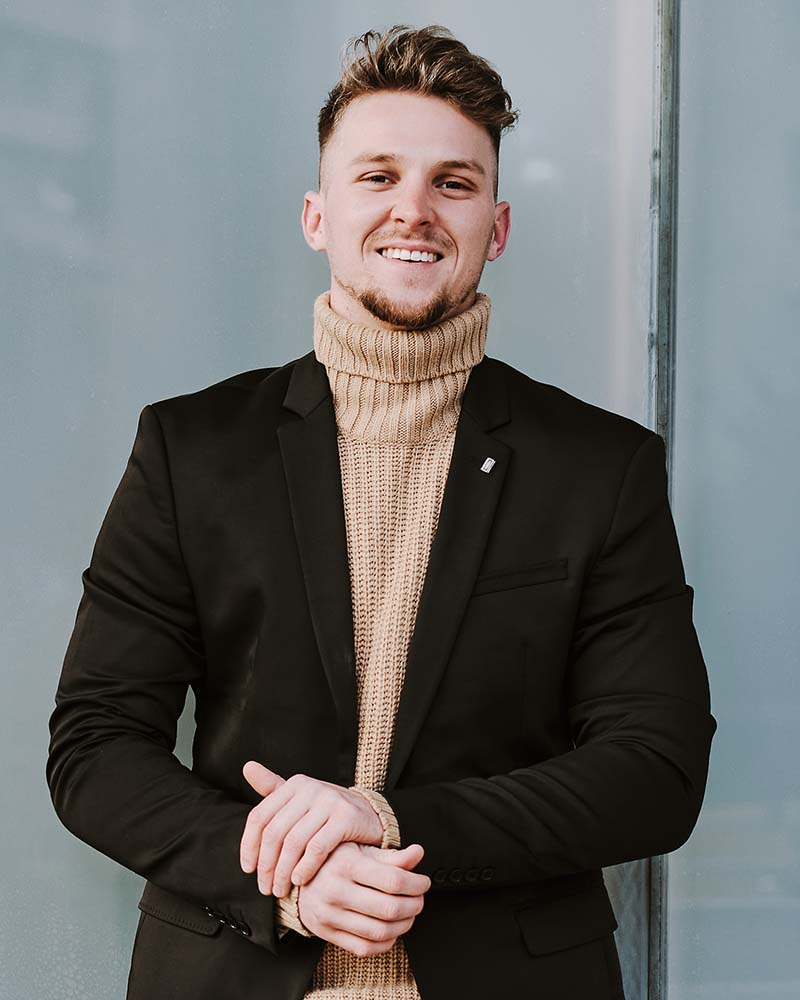 portrait of a stylish man with a skateboard nz2ayhc.jpg