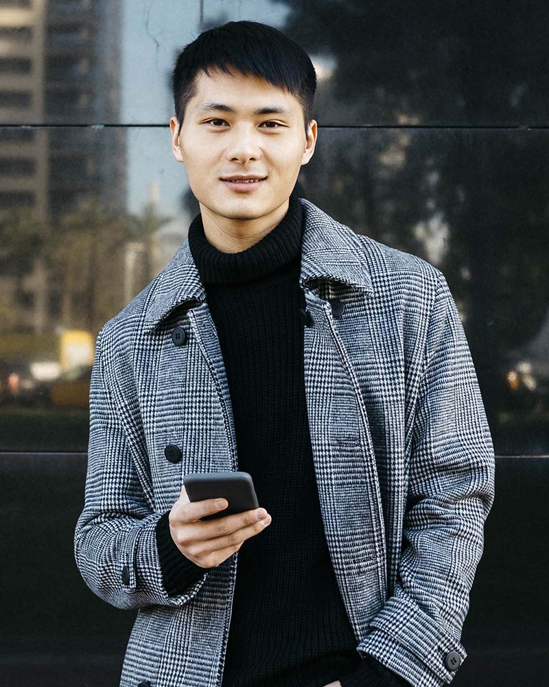 spain barcelona portrait of young man with cell mgkfhqd.jpg